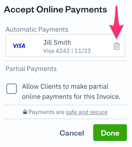 Trash can icon over saved payment information.
